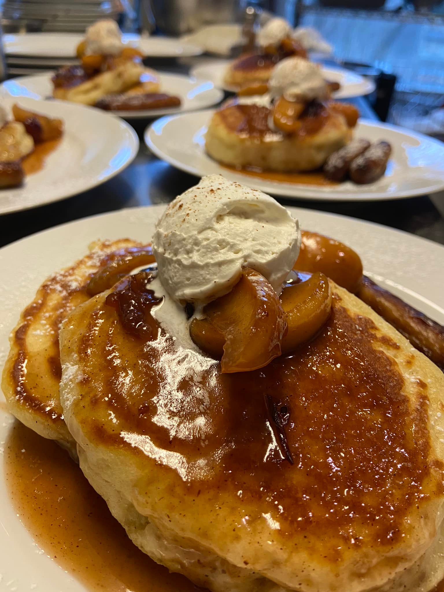 Holiday apples and cinnamon buttermilk sky high pancakes with nutmeg whipped cream.
