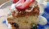 Our Maine blueberry sour cream coffee cake with strawberries and drizzled with a maple cream anglaise.